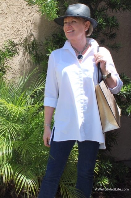 A classic white shirt with jeans and leopard shoes is casual and chic for running errands