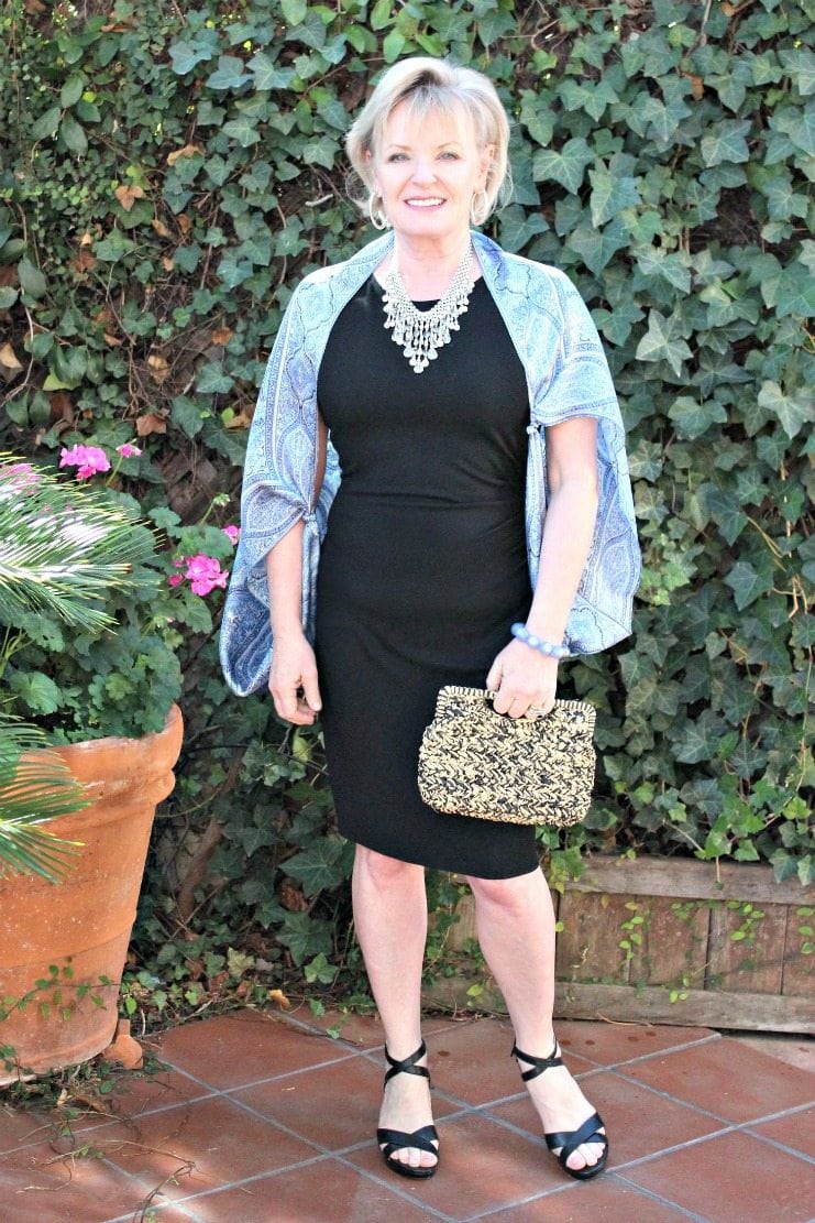 Jennifer Connolly of A Well Styled Life wearing black dress with pale blue scarf