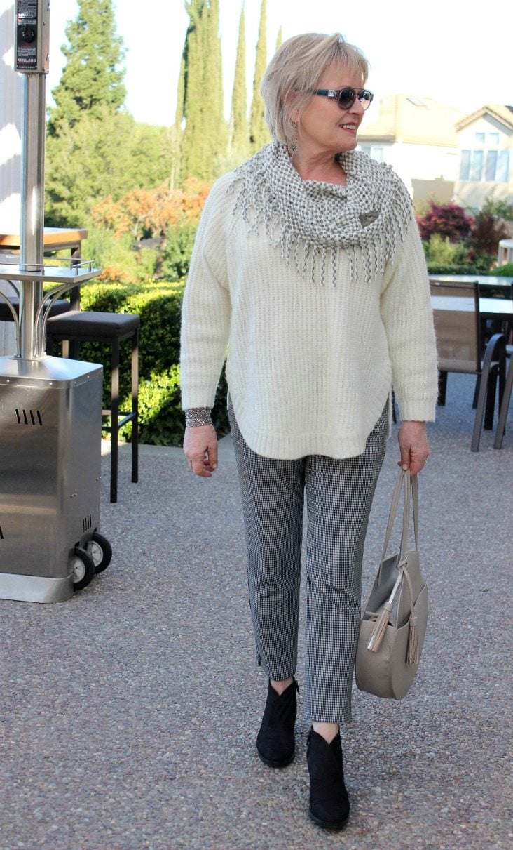 Jennifer Connolly of A Well Styled Life wearing gray accessories with ebony and ivory clothes