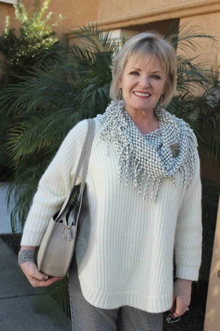 Jennifer Connolly of A Well Styled Life wearing Ivory sweater and gray cowl with French Kande earrings