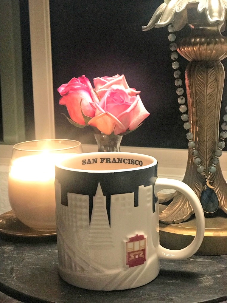 starbucks mug and Sanari candle on A Well Styled Life