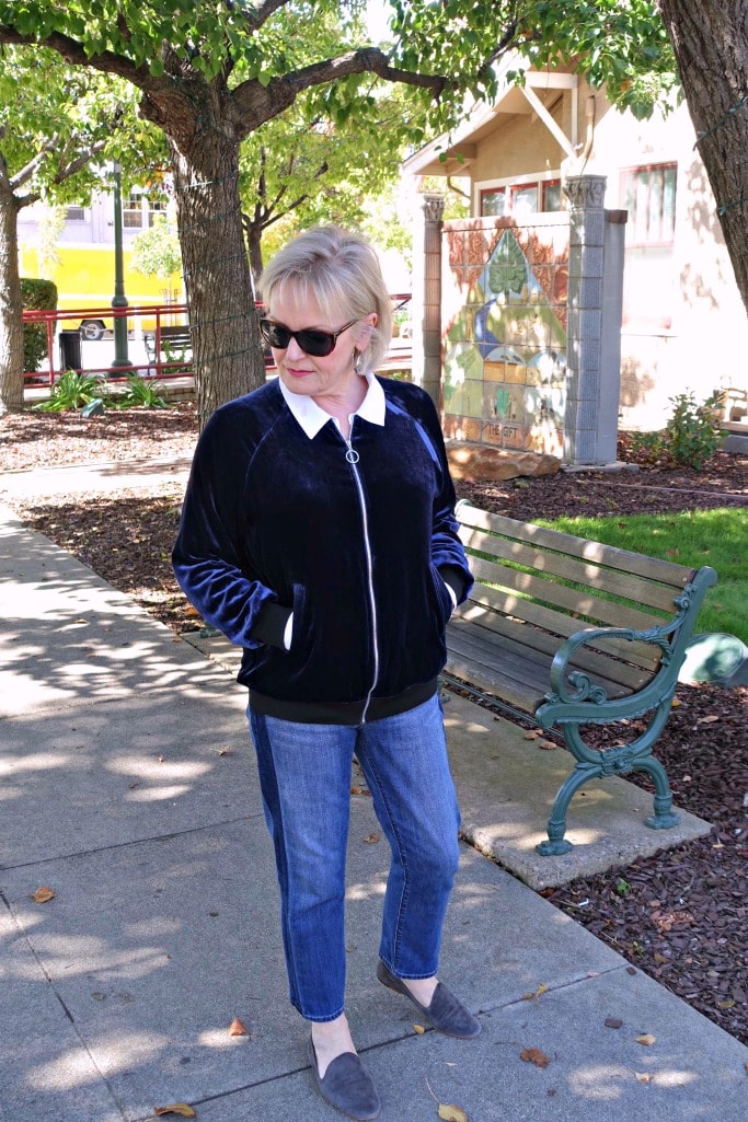 Jennifer Connolly from A Well Styled Life wearing velvet baseball style jacket from LilySilk