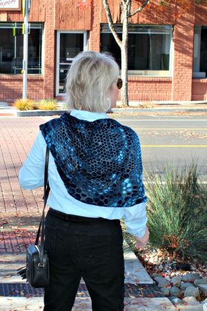 jennifer connolly from a well styled life wearing blue velvet burnout cape with leopard print pattern