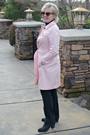 Jennifer Connolly of A Well Styled Life wearing NYDJ Marilyn jeans in black with Talbots Modern Trench coat in pink