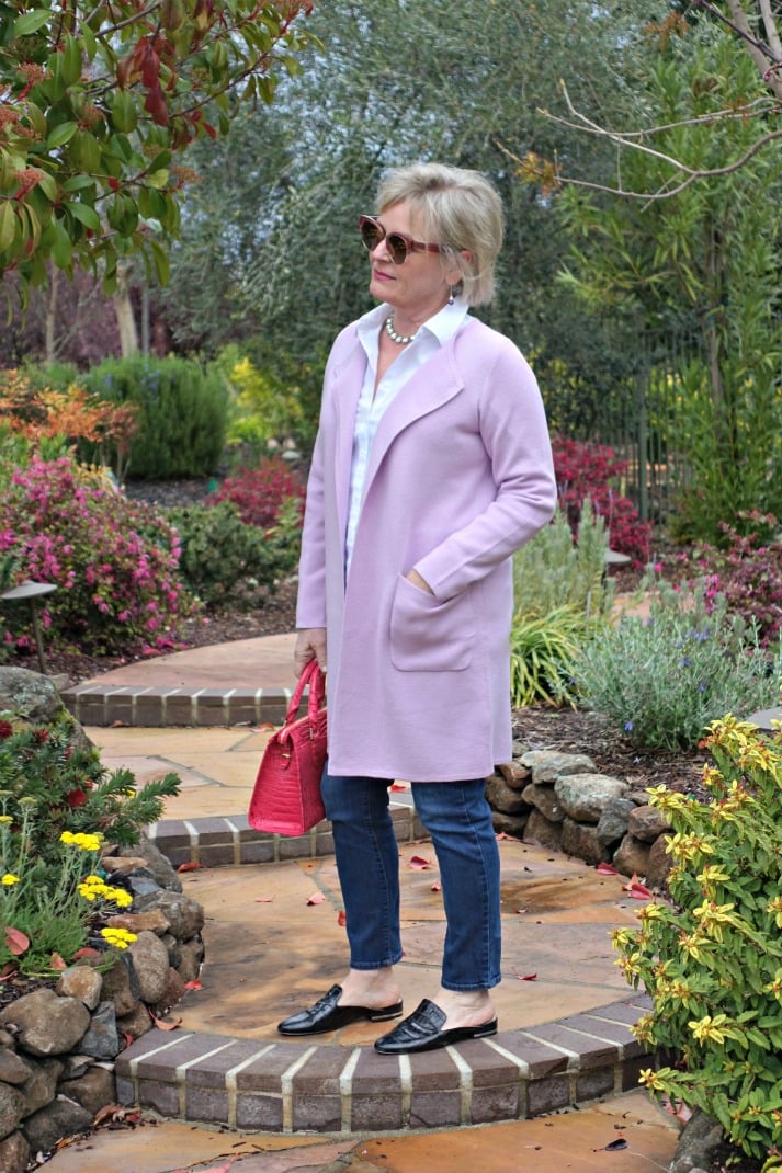 J.Crew sweater blazer in Wysteria over blue jeans and white blouse on Jennifer Connolly in park setting