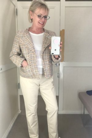 Jennifer of A Well Styled Life wearing beige tweed jacket and beige chino's from Loft on A Well Styled Life