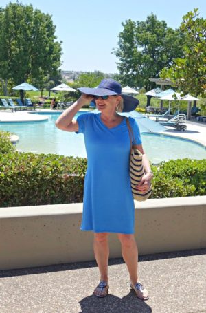 A wide brim floppy hat with built in sun protection from Walmart worn by Jennifer Connolly of A Well Styled Life
