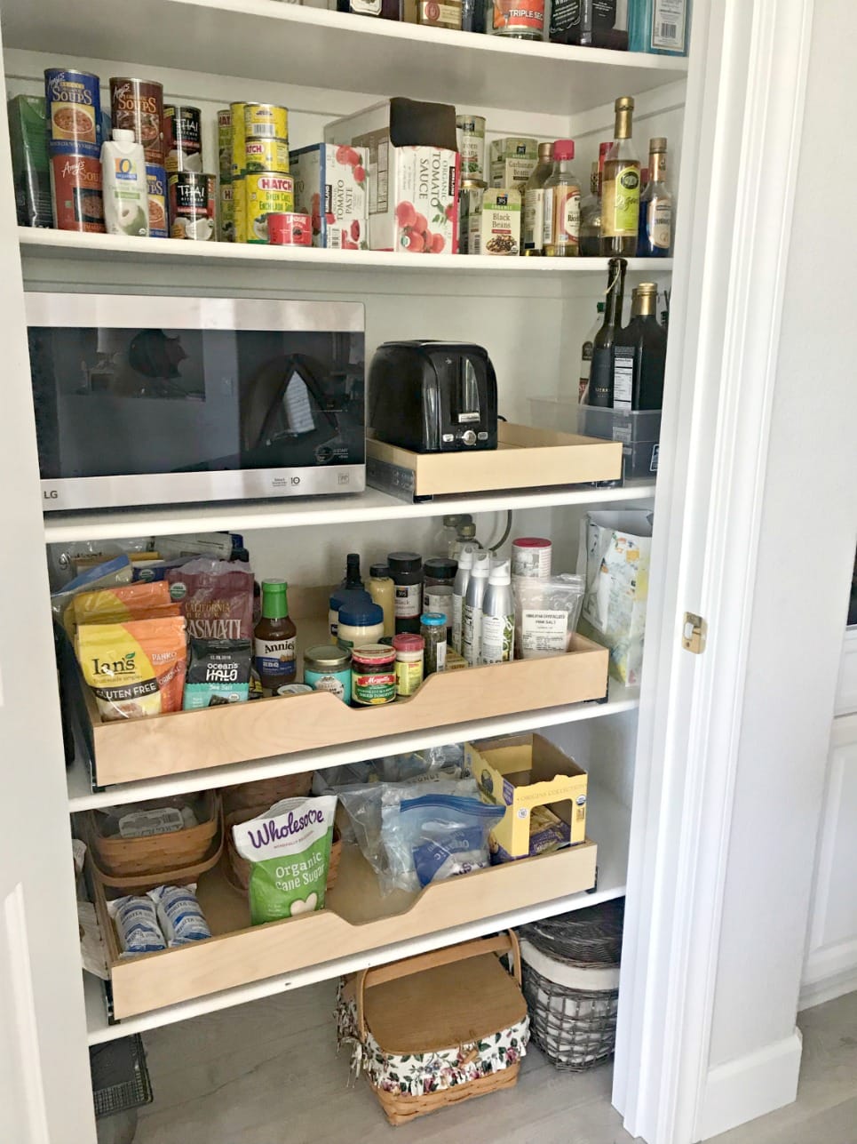 pantry after renovation with pull out shelves on A Well Styled Life