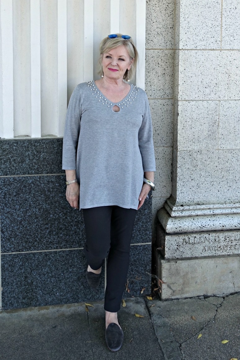 Jennifer Connolly of A Well Styled Life wearing casual gray tunic over ultra suede leggings from Ethyl Clothing