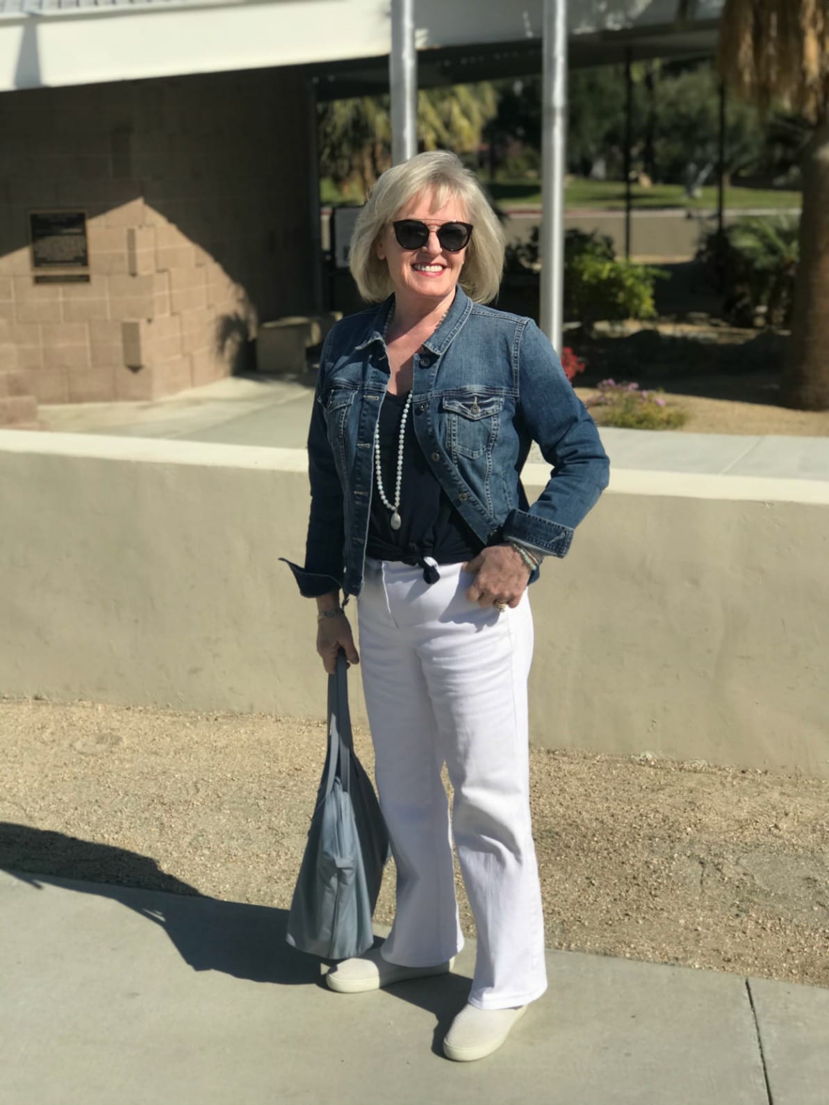 Jennifer Connolly of A Well Styled Life wearing Vince denim jacket and Talbots white jeans