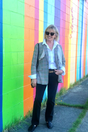 fahsion blogger jennifer of A well styled life wearing black jeans, white shirt and plaid blazer