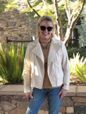 fashion blogger jennifer connolly of a well styled life wearing ivory jacket and camel sweater