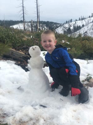 boy with snowman