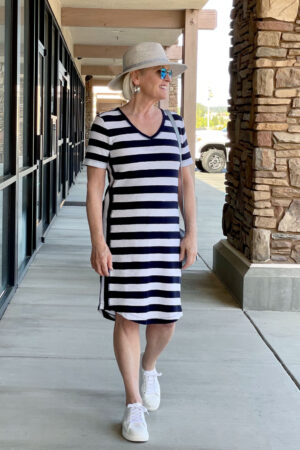 side view of striped dress on blonde woman