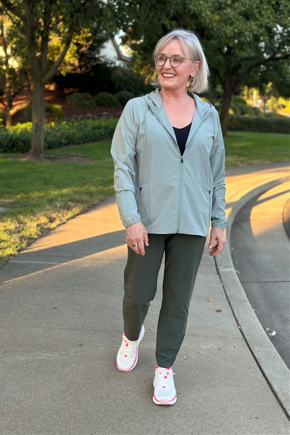 Jennifer walking in athletic wear for women over 60.