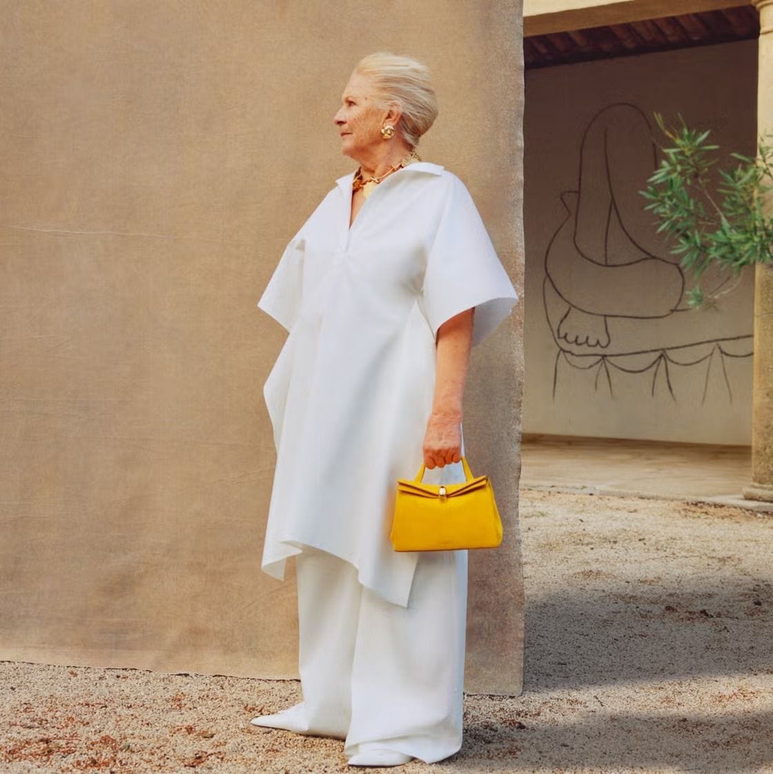 a woman dressing with confidence and not worried about being overdressed