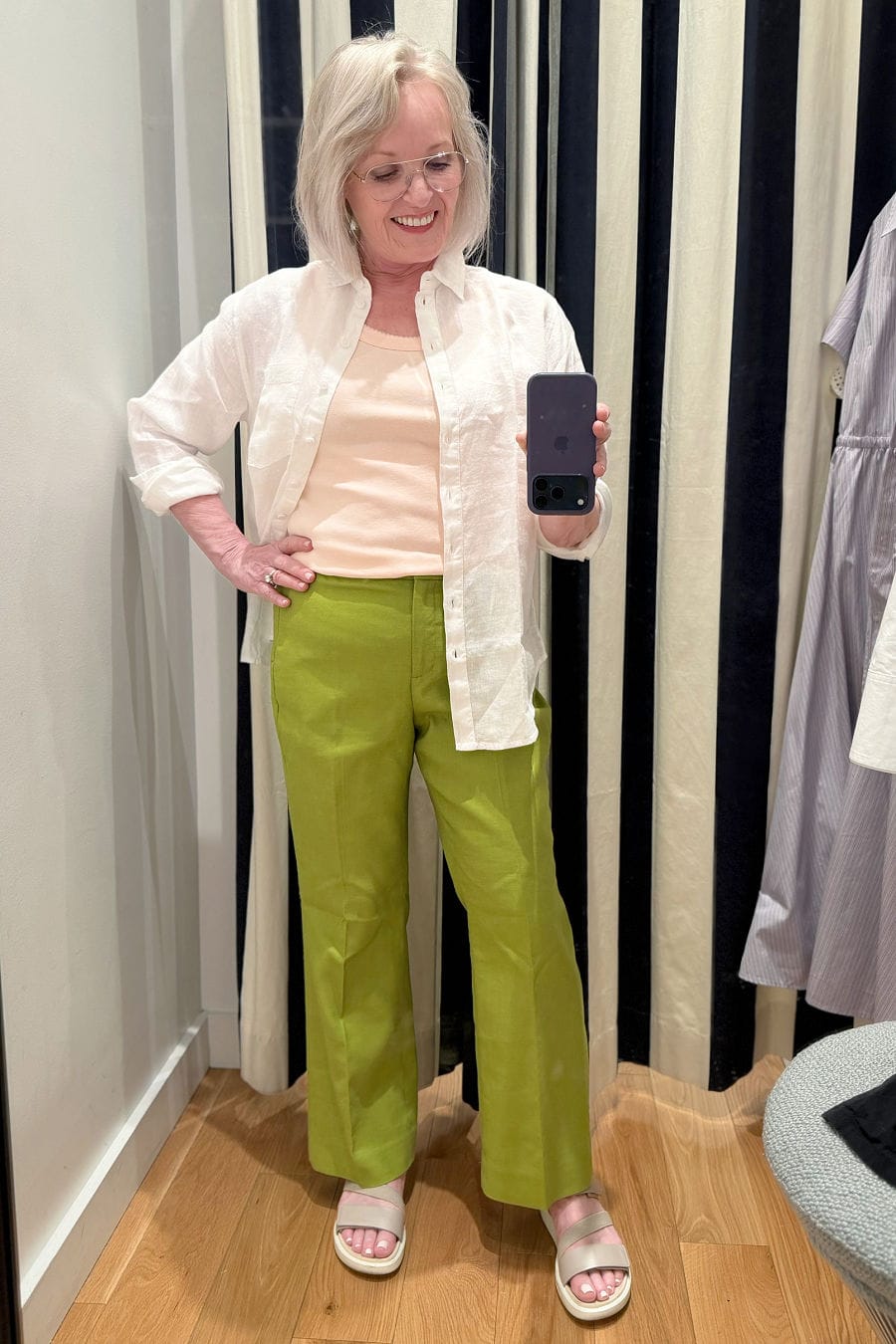 women trying on jcrew line shirt and linen pants from new spring 2026 collection