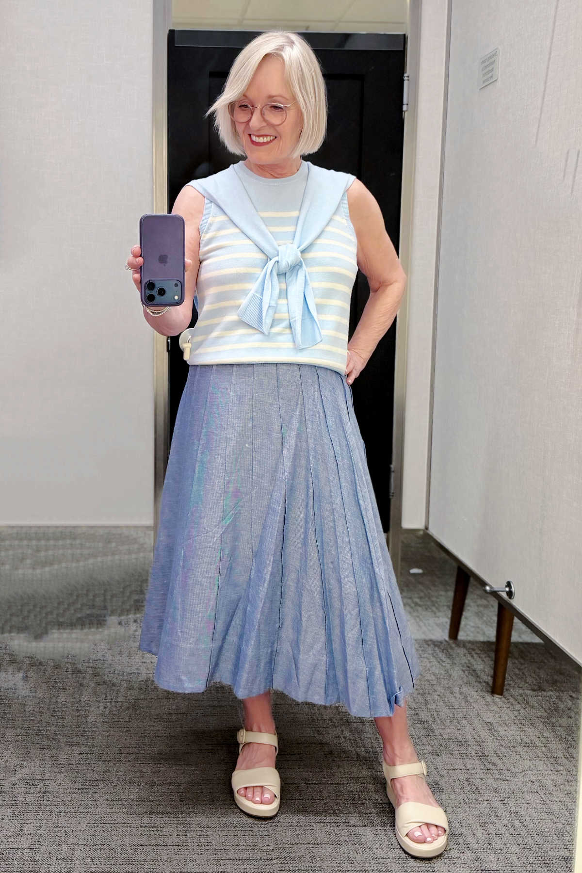 Classic summer outfit with a blue chambray pintuck midi skirt and a sleeveless striped sweater tank.