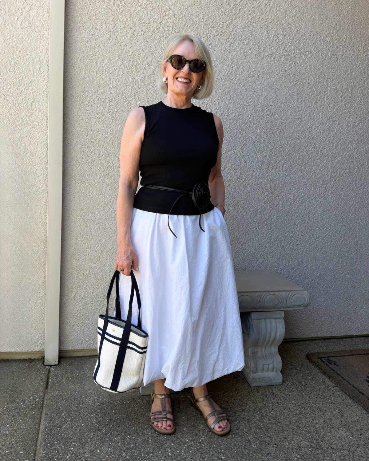 Personal stylist Jennifer wearing a white balloon skirt outfit as an example of dressing for how you need to feel.