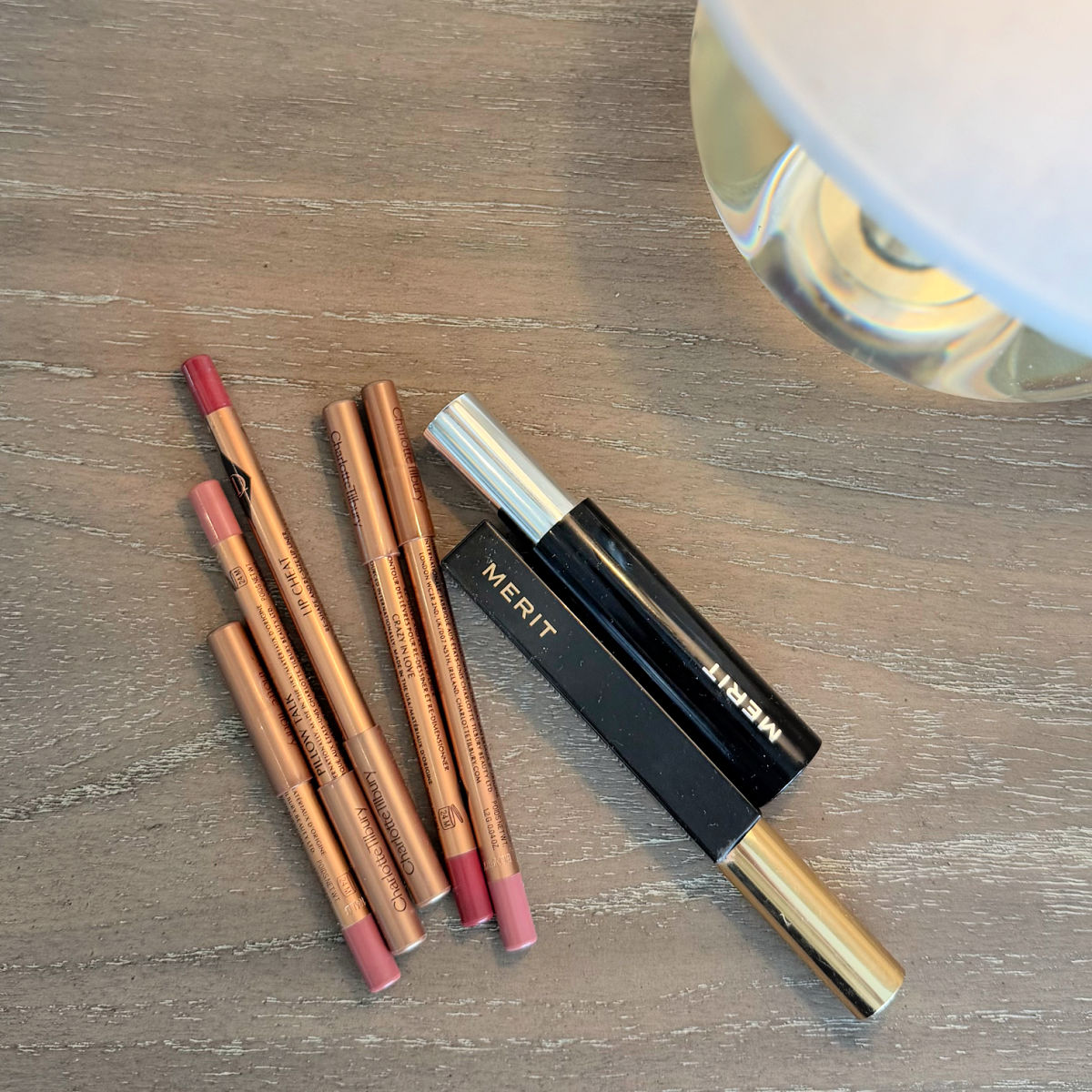 my collection of favorite merit mascaras and charlotte tilbury lip cheat lip liners