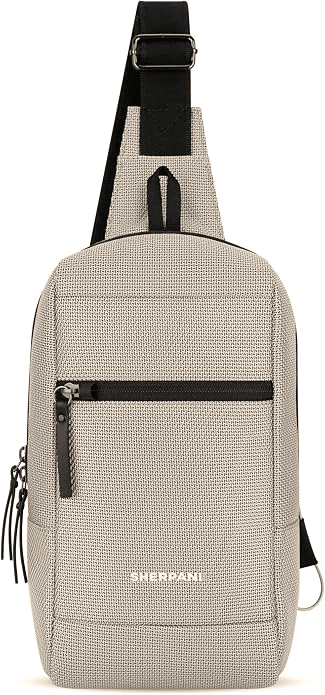 Sherpani Metro reversible sling bag worn across the body